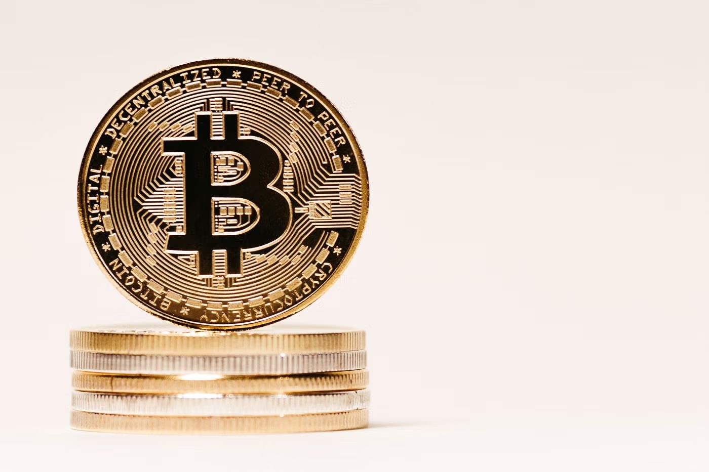 Stacked gold cryptocurrency coins